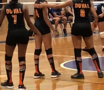 Volleyball Teams Go Pink in Honor of Breast Cancer Awareness